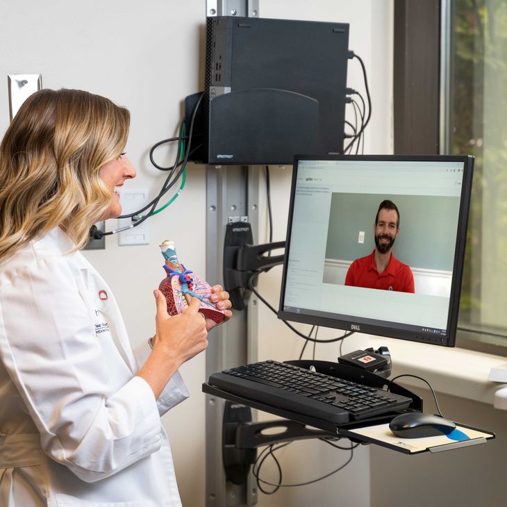 physician performing telehealth visit with patient