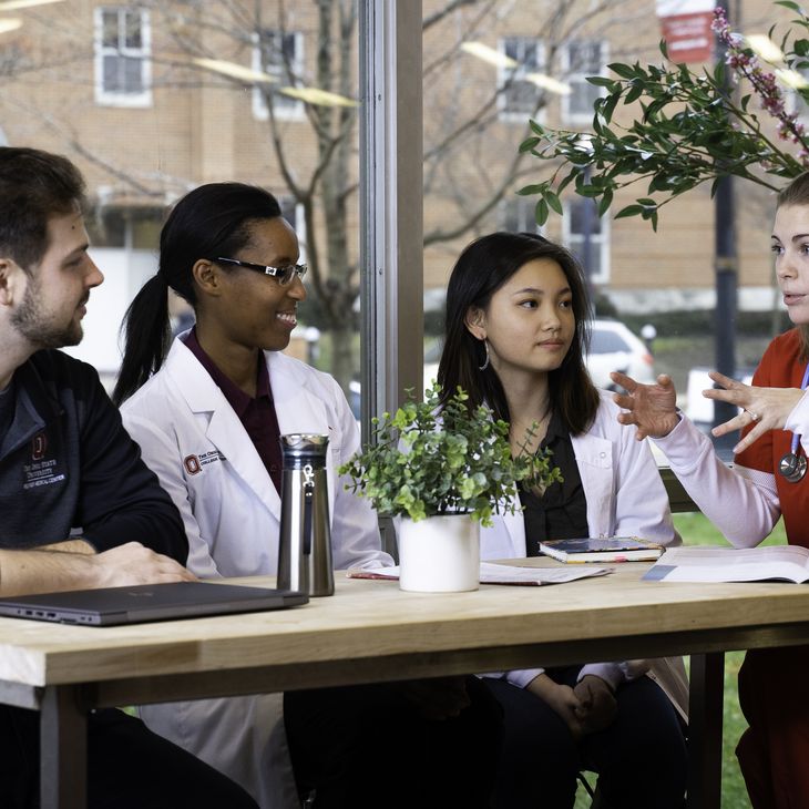 Group of nursing students at table