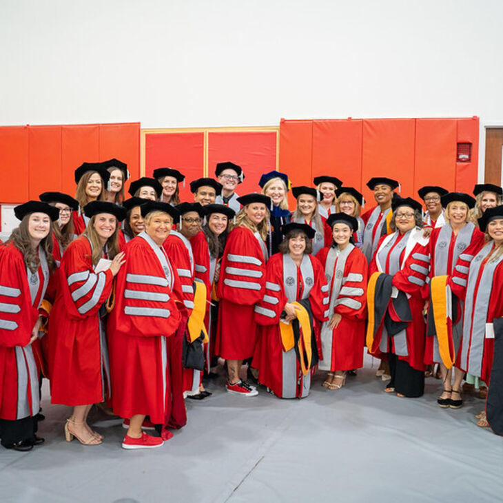 Dean Rose with students at Convocation 2024