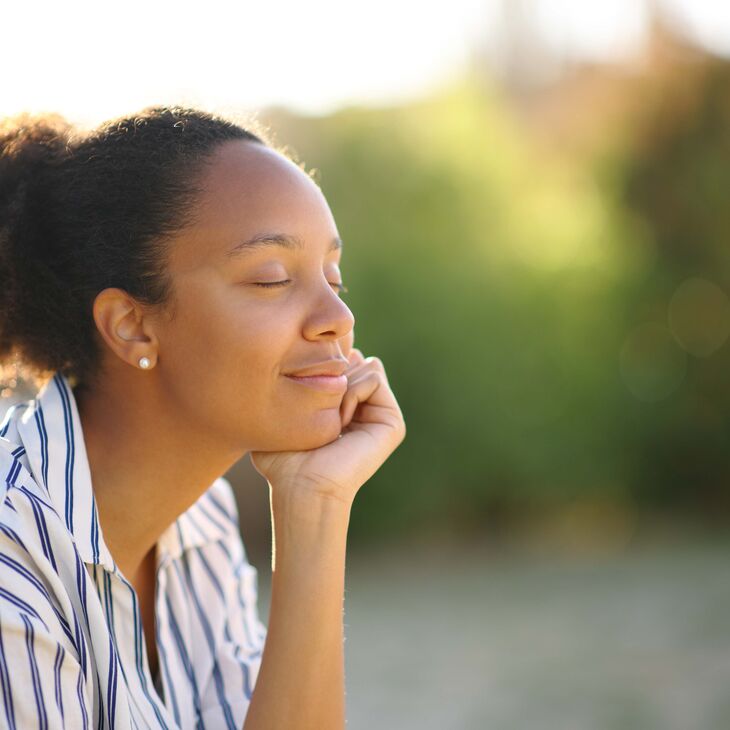 relaxed woman resting in a park