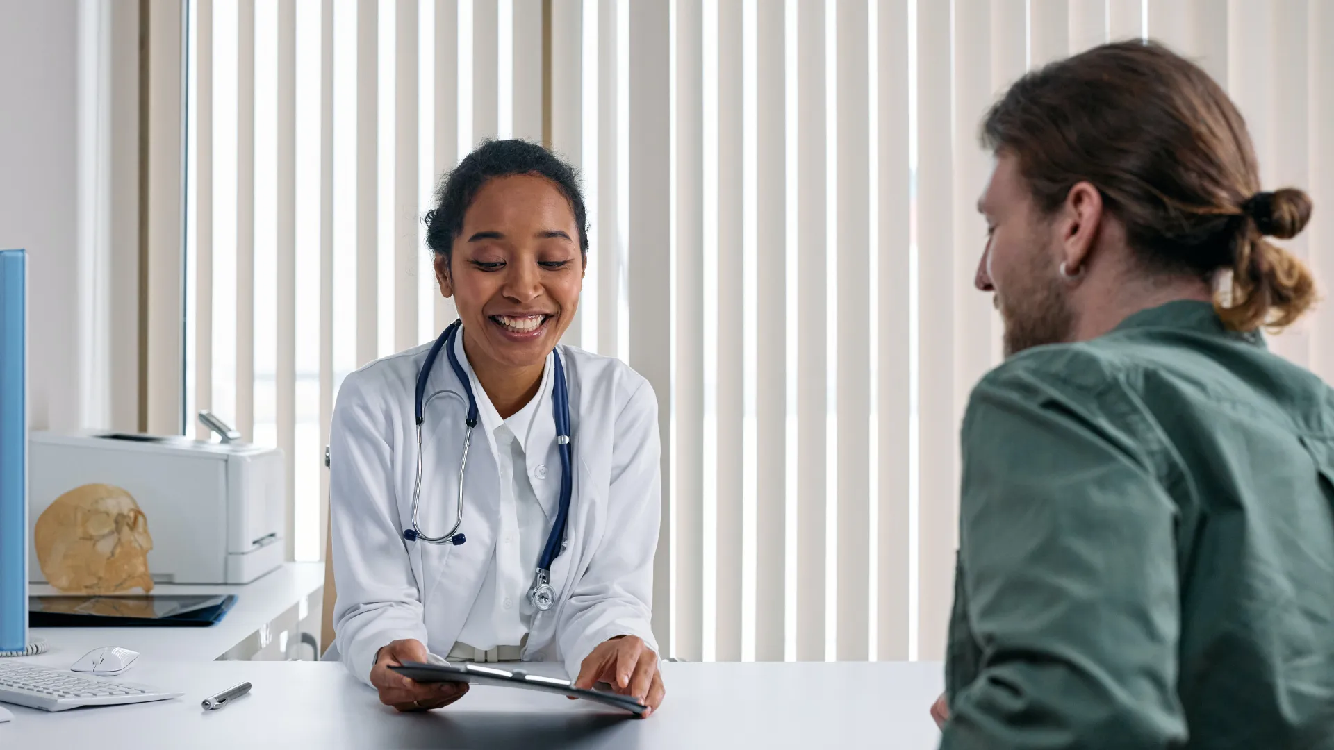 DNP nurse consults with patient