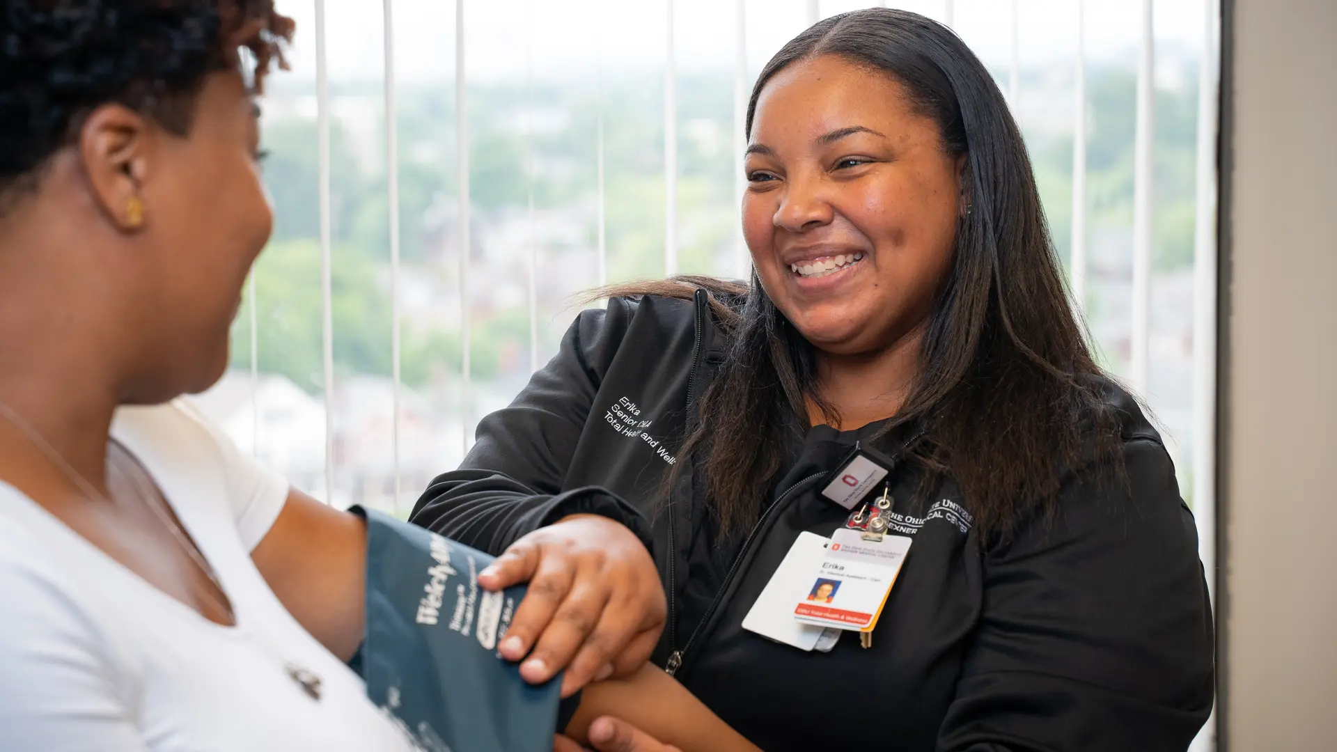 nurse taking a patient's blood pressure