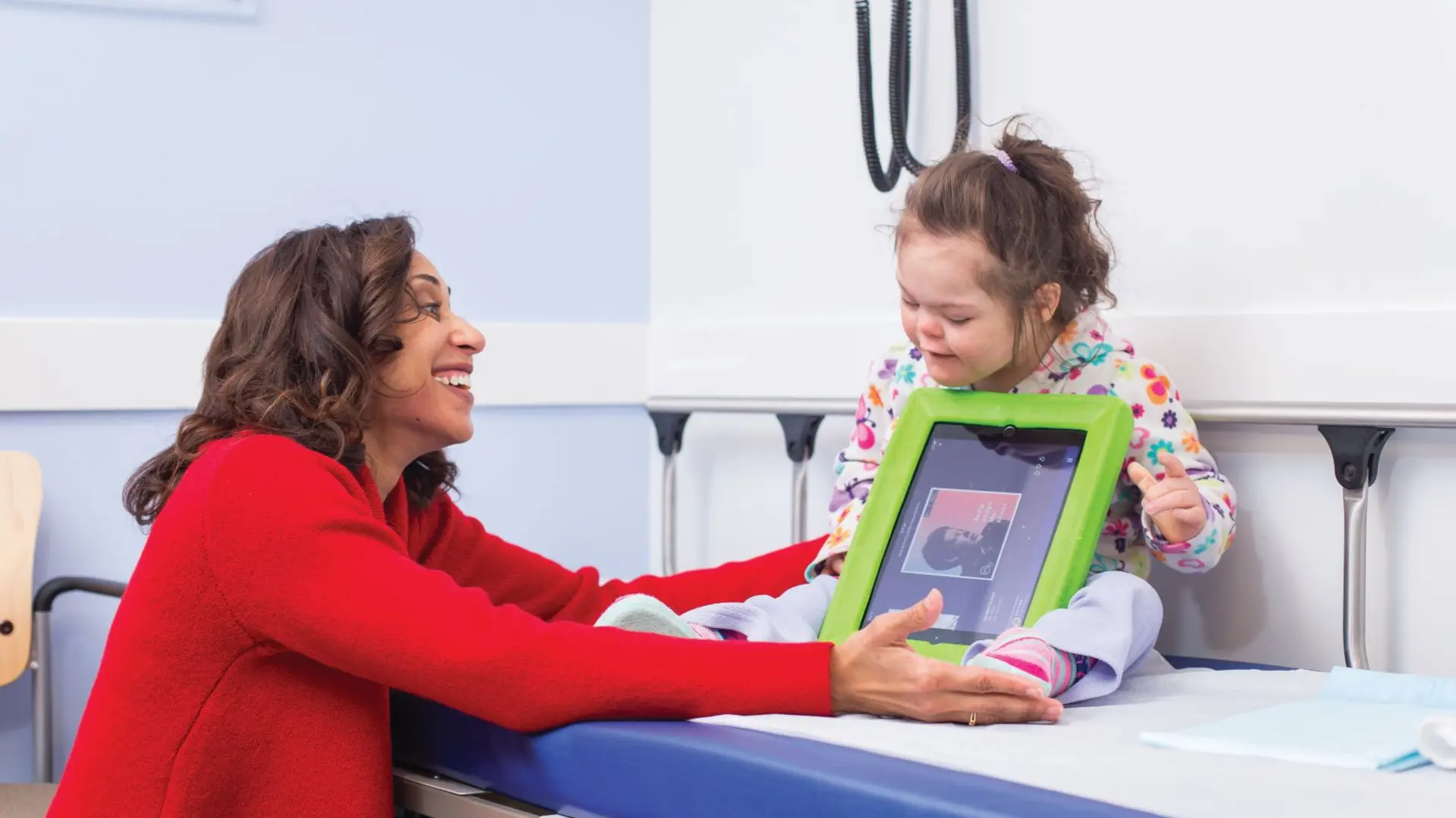 nurse practitioner treats an adolescent patient