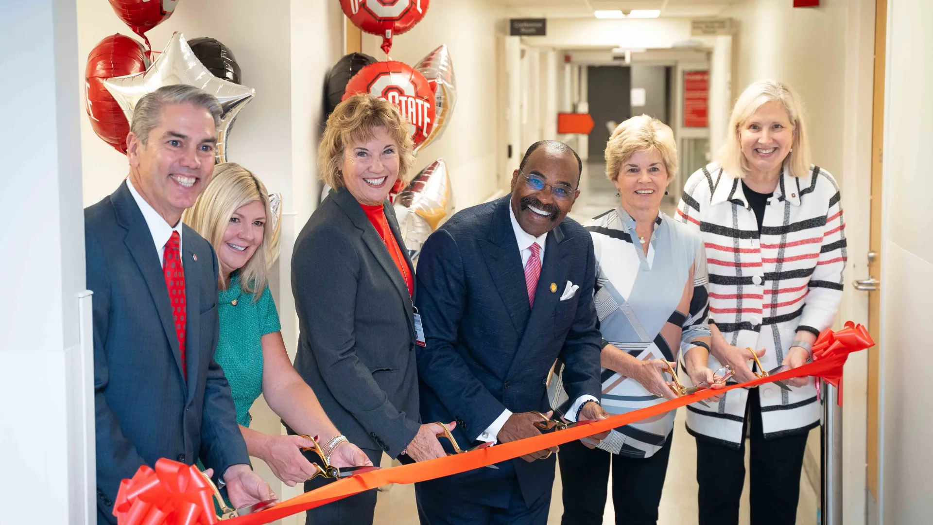 At the official ribbon cutting ceremony: Jay Anderson, Chief Operating Officer of The Ohio State University Wexner Medical Center; Senator Stephanie Kunze, Candy Rinehart, Senator Hearcel Craig, Community Board President Linda Mauger, Dean Karen Rose.