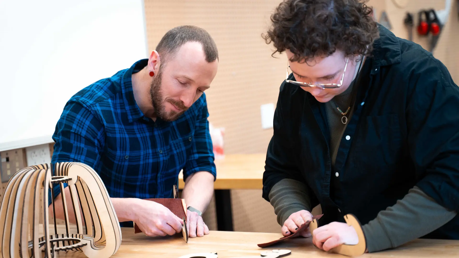 two people working in our Innovation Studio