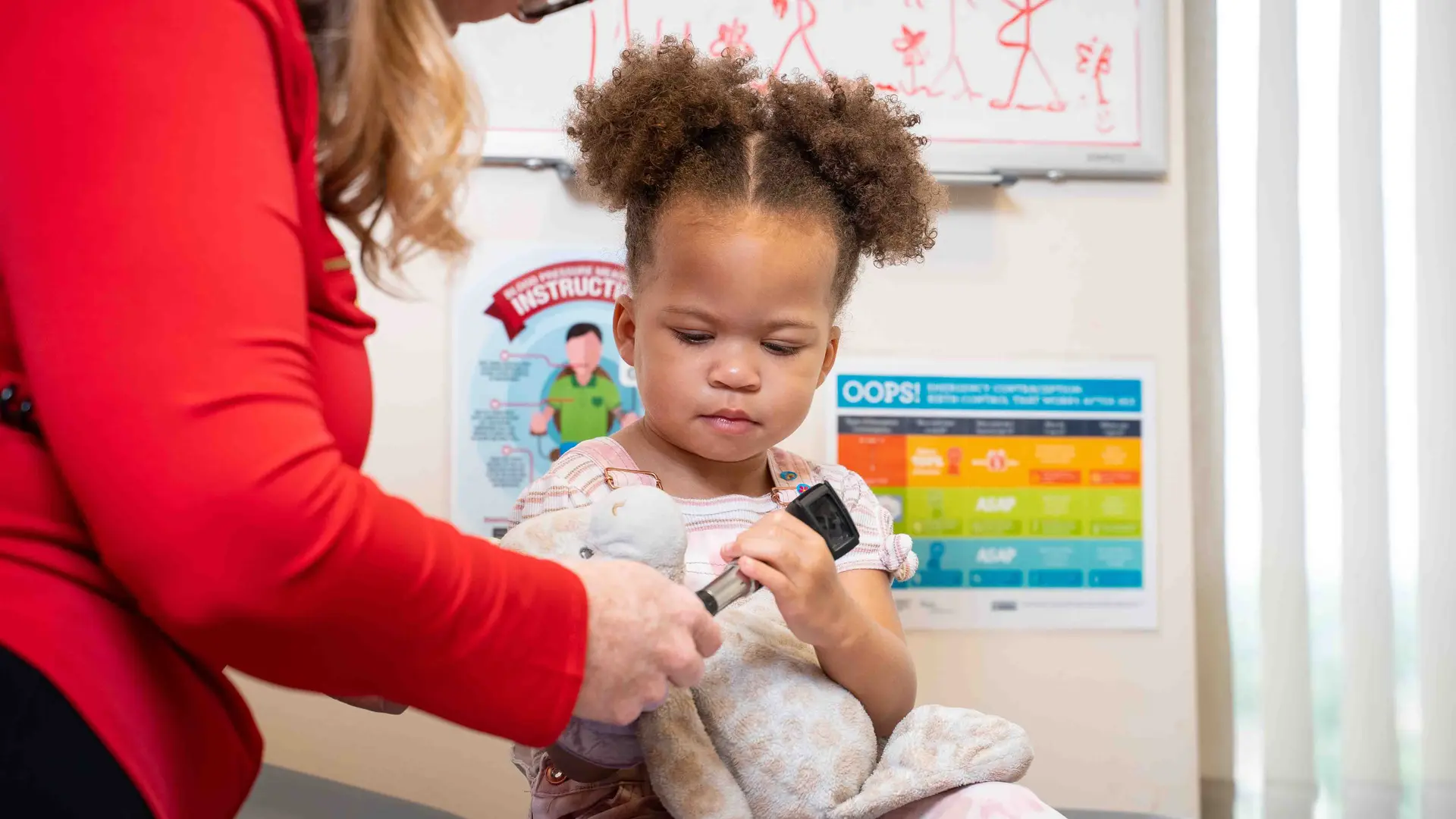 nurse caring for young patient