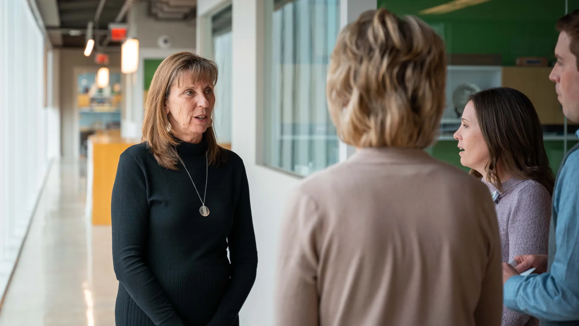 Kay Smith speaking with students