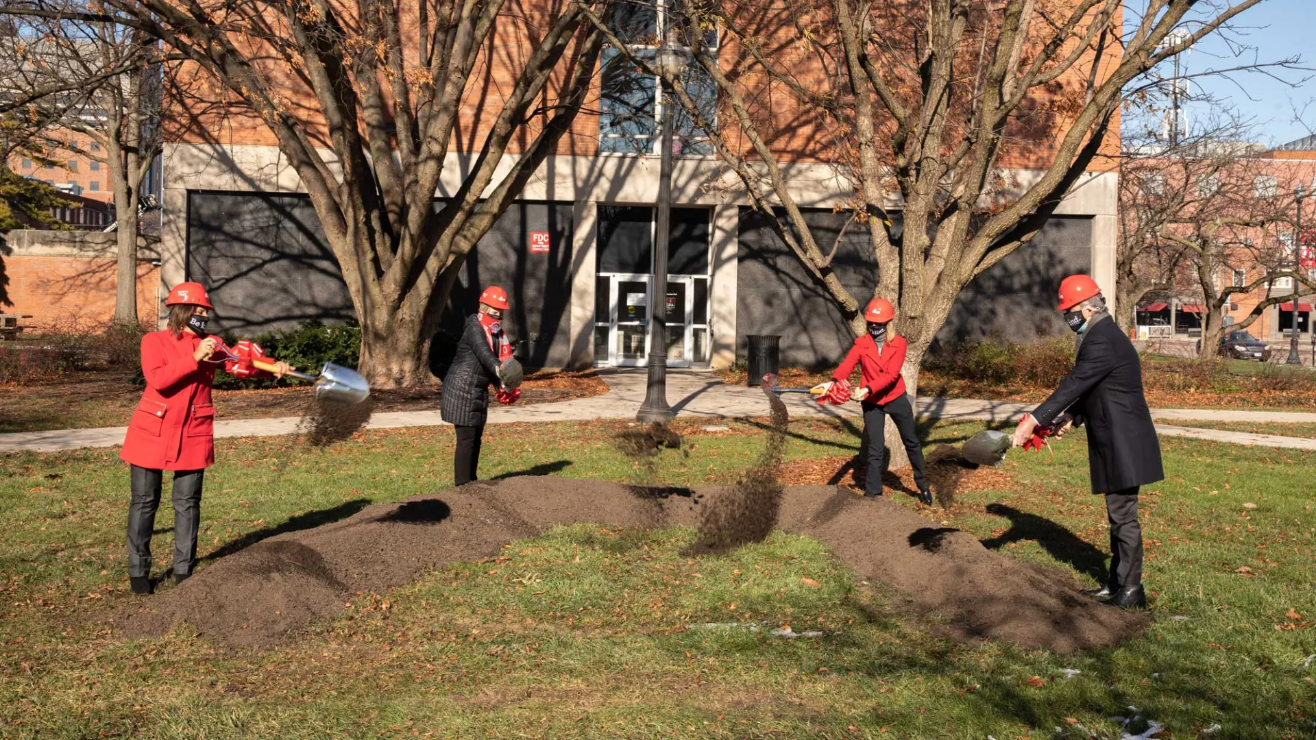 Bern Melnyk, Margaret Graham, Laurel VanDromme and Hal Paz doing the first dig at the groundbreaking ceremony
