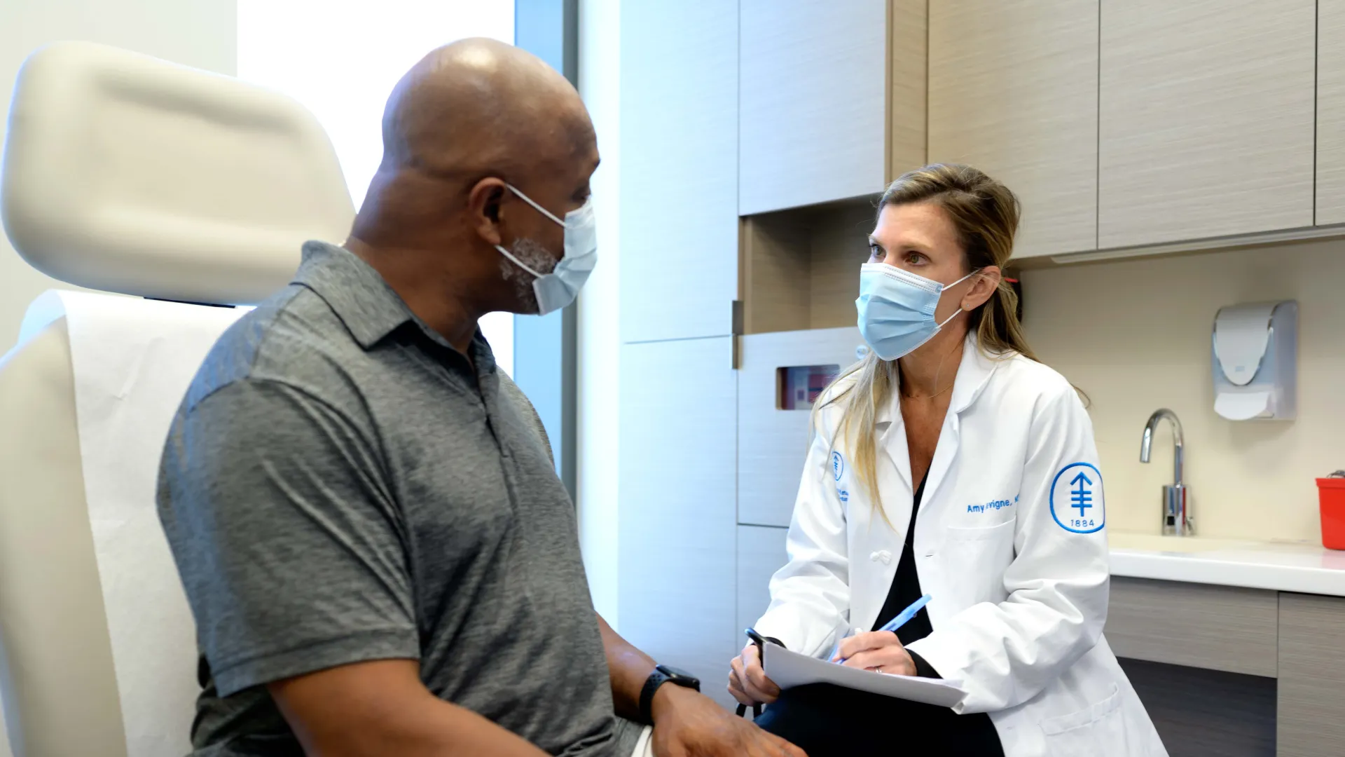 Clinician and patient at Memorial Sloan Kettering Cancer Center