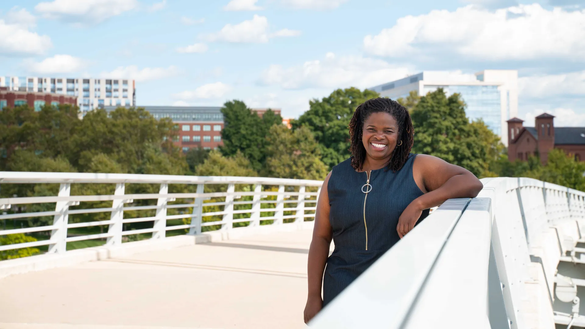 Denise Williams standing on a bridge in downtown Columbus