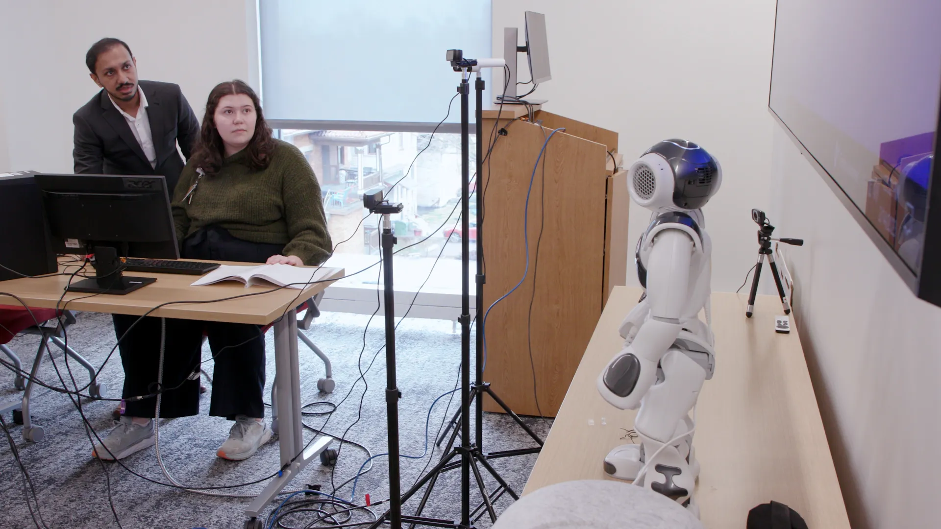 engineers testing robot