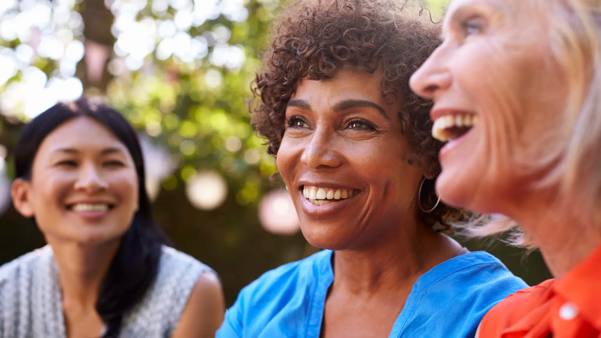 Group of three senior women smiling
